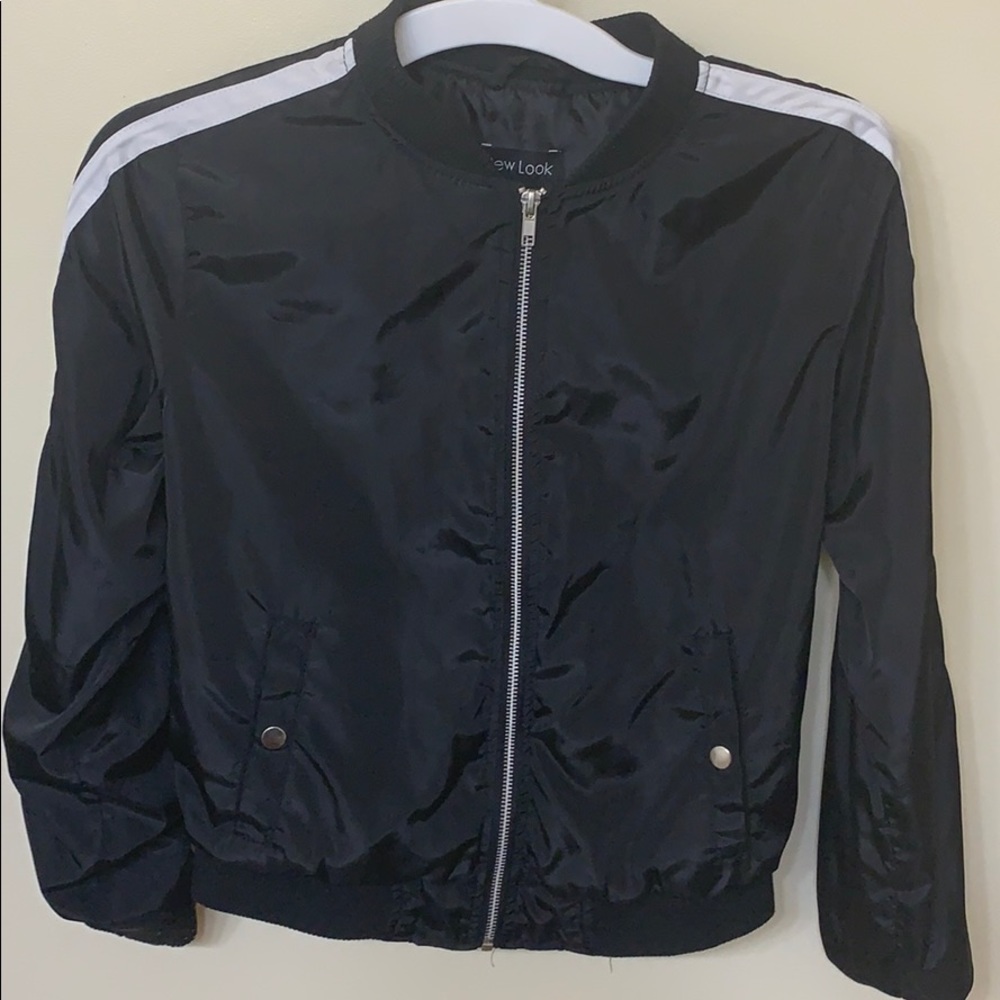 black jacket with white stripes
